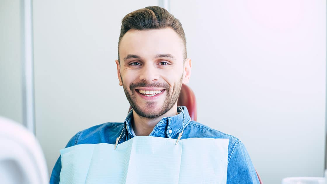 Patient In Operatory Smiling